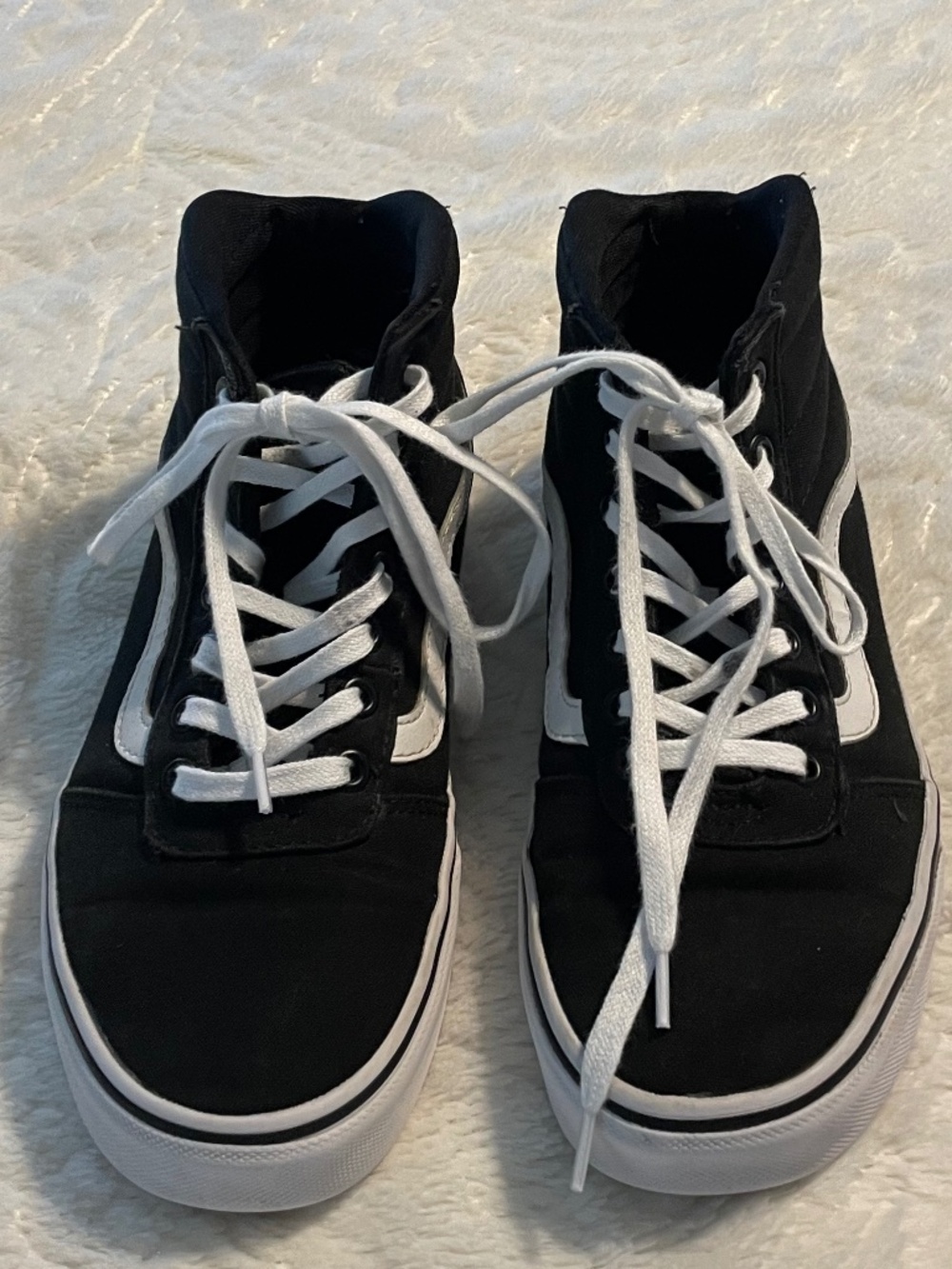 Black & White Women’s Size 8 Hightop Vans.